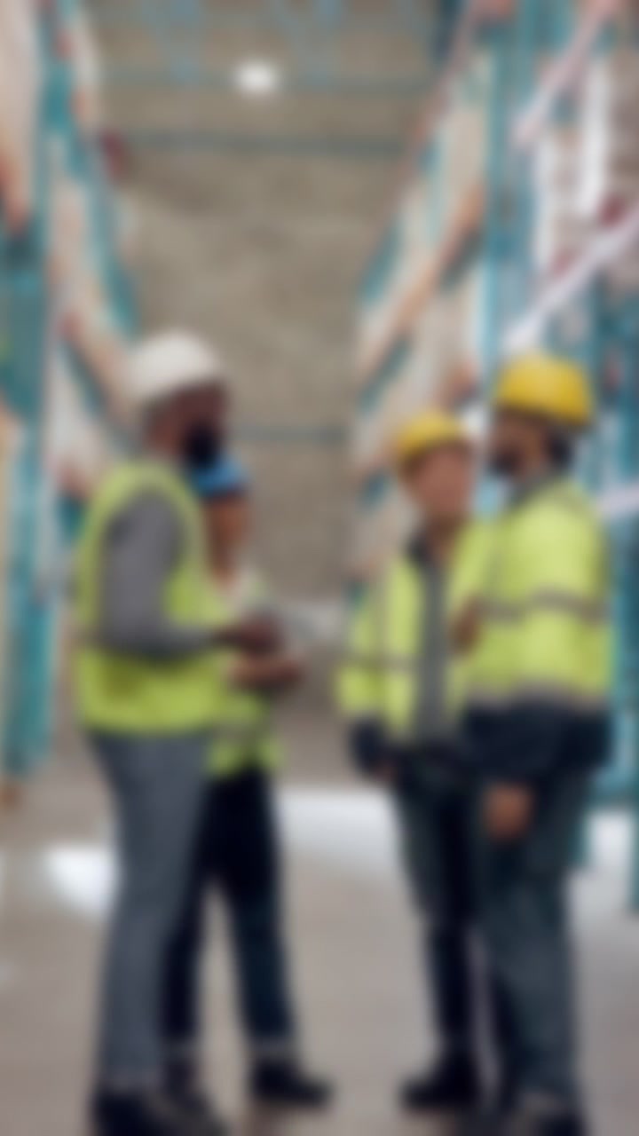 Warehouse Workers Managing Inventory and Logistics in Distribution Center