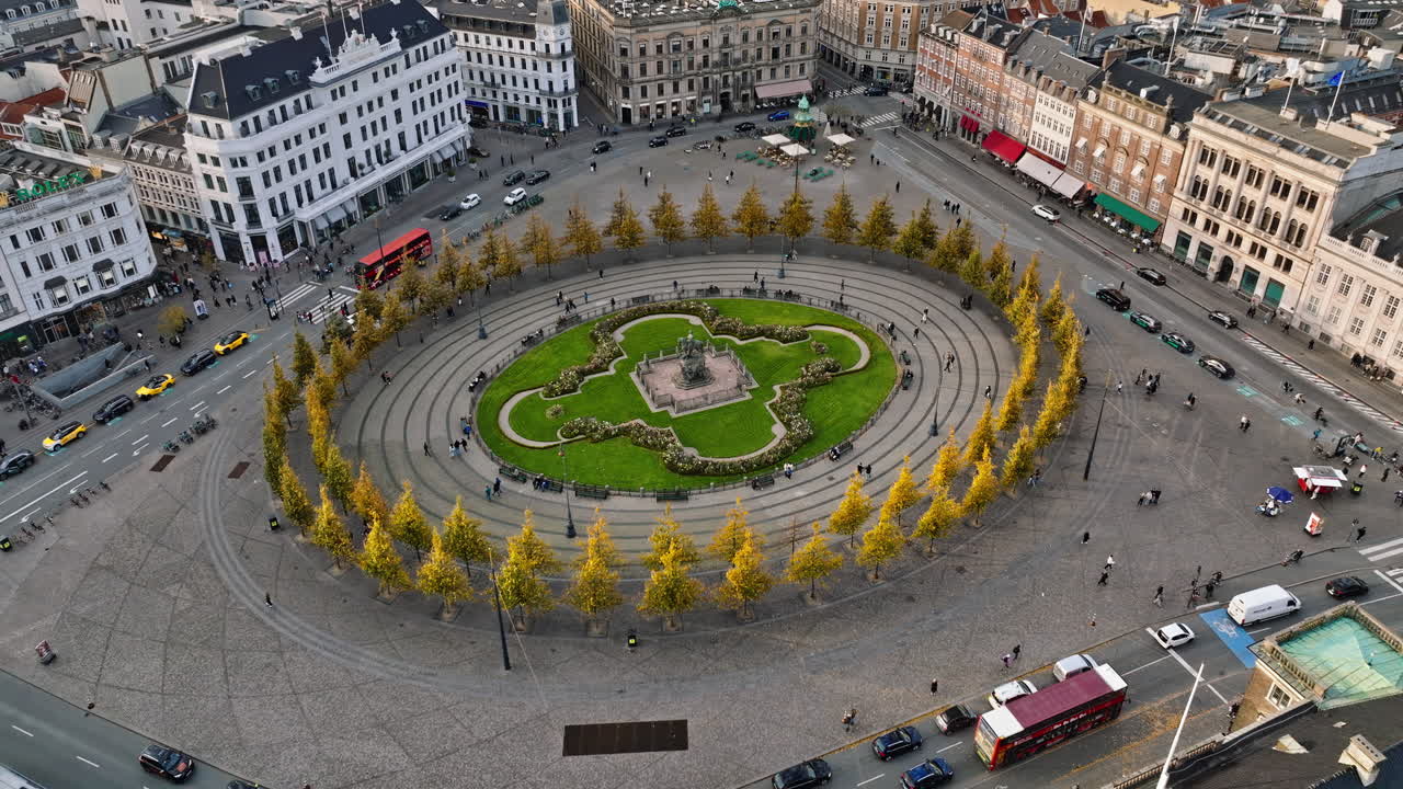 Aerial drone view of the Kongens Nytorv public square in Copenhagen, Denmark in daylight