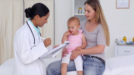doctor asking question about a baby