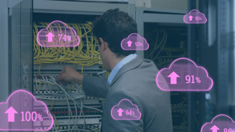 animation of cloud icons with growing numbers over caucasian man in server room