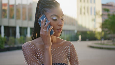 fashion tourist lady calling phone at sunny neighbourhood closeup. woman talking