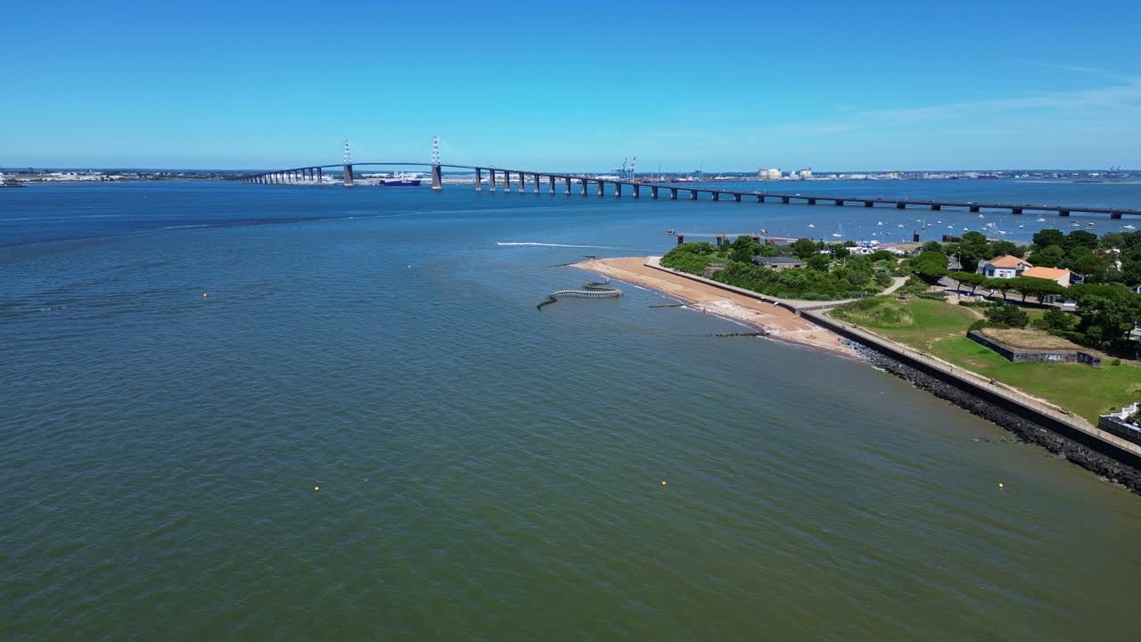 Bridge over the sea with beach coast view