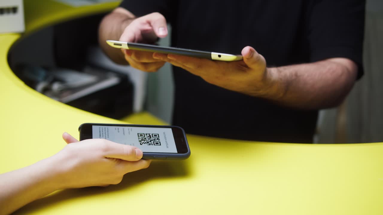 Customer Scans QR Code on Smartphone for Digital Payment