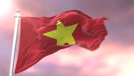 la bandera de vietnam ondeando en el viento al atardecer, bucle