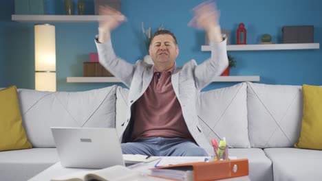 home office worker man getting bad news from camera.