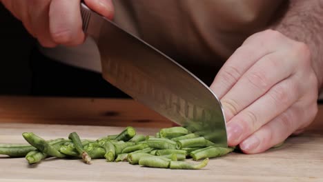 chef chopping green beans