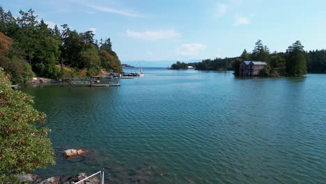 a drone shot of the docks and cole island in view royal, victoria, canada