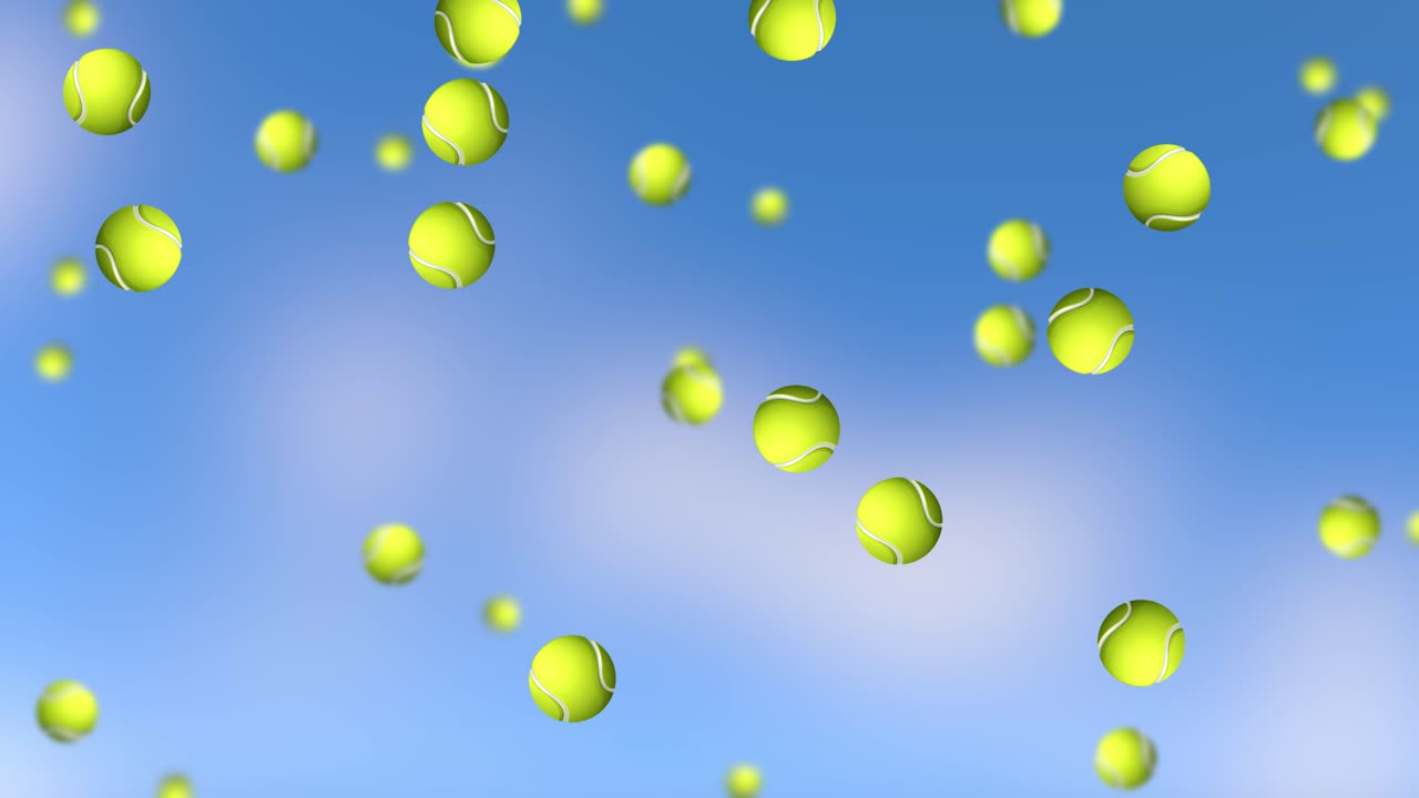 테니스 공이 파란 하늘을 배경으로 내려오고 있습니다.