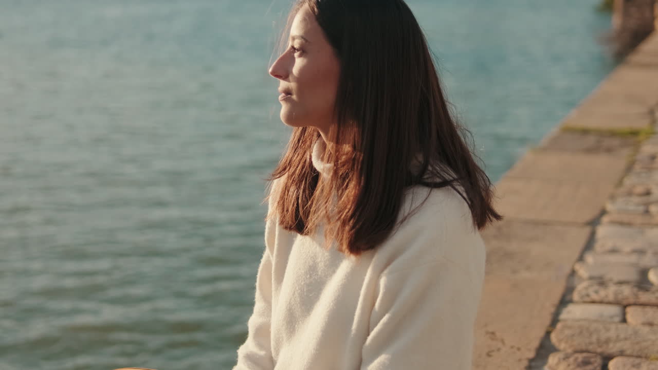 Woman by the Guadalquivir River in Seville