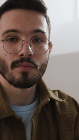 portrait of a man with glasses and beard