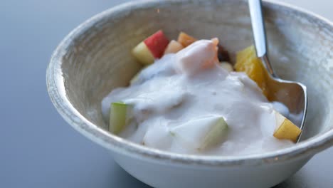 fresh yogurt in a bowl on table