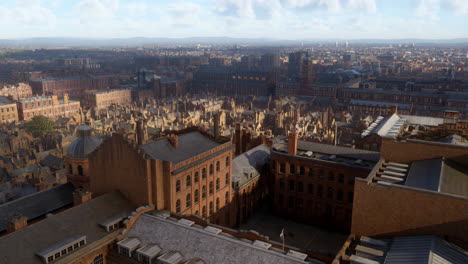 aerial view of a dense historic city with many buildings under a cloudy sky