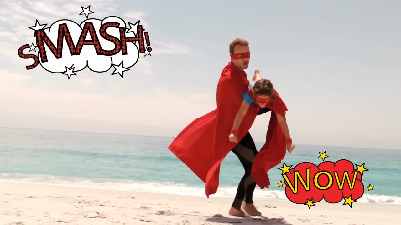 아버지 는 해변 에서 아들 과 함께 놀고 있으며, 만화 를 쓰고 있다