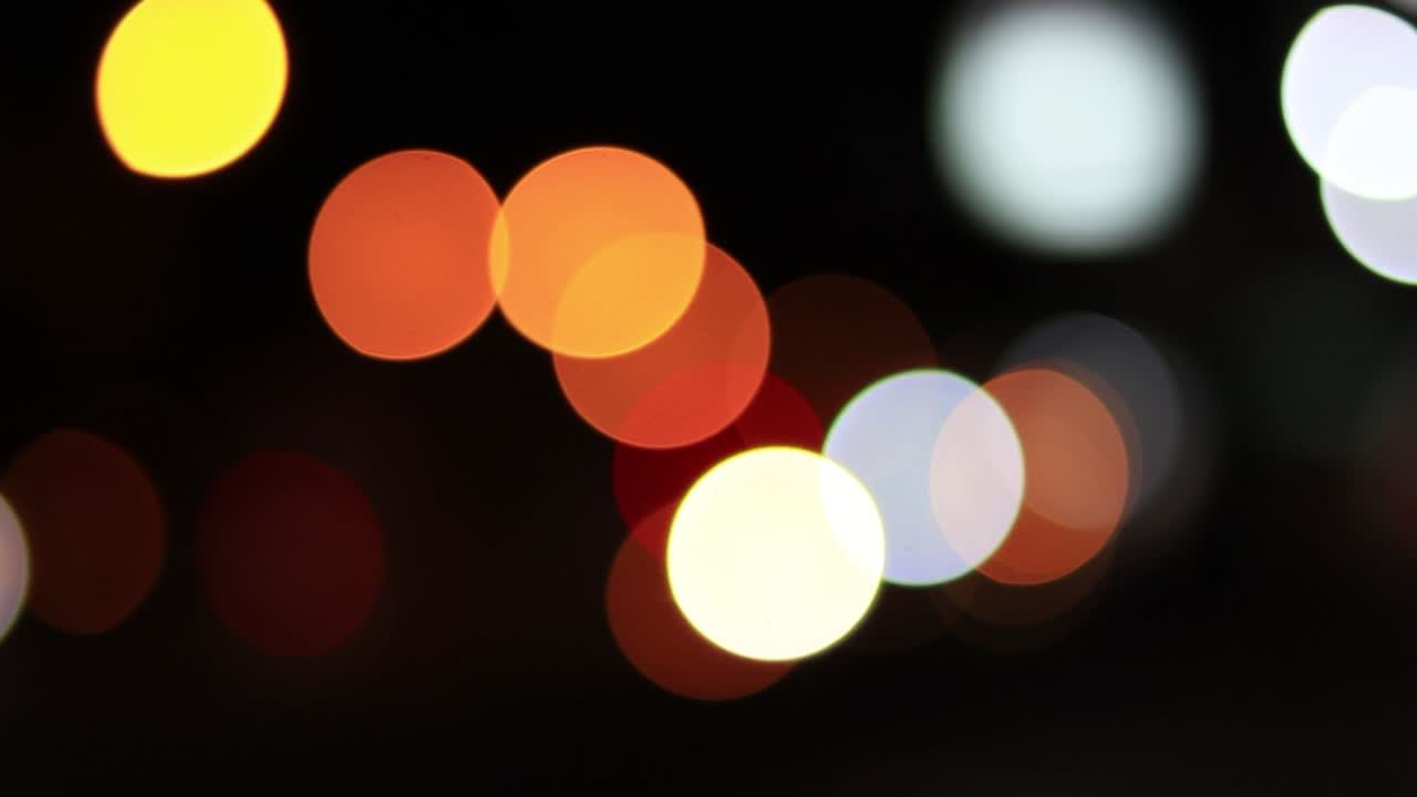 Bokeh light in the city night background, bokeh backgrounds