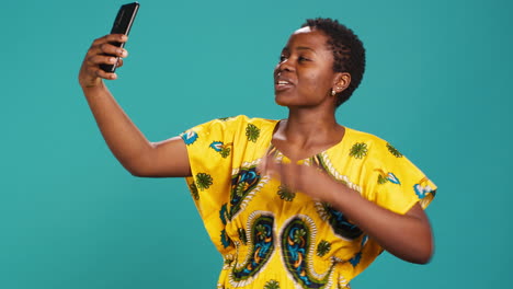 Female-model-being-excited-and-happy-on-her-pictures-in-studio