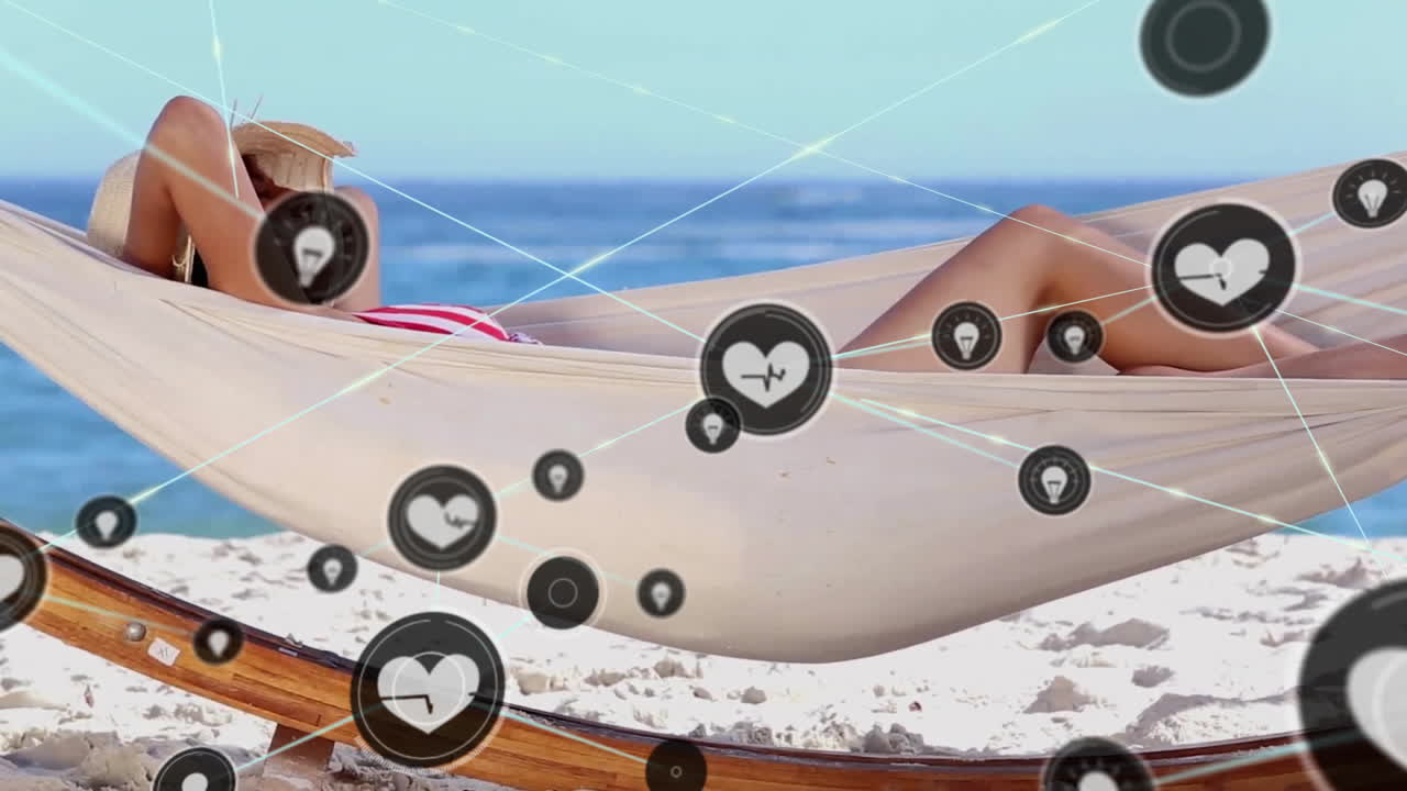 해변에서 햄록에 누워있는 두 인종의 여성에 대한 아이콘과 연결 네트워크의 애니메이션