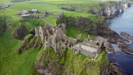 Aerial-shot-of-Dunluce-Castle,-in-Bushmills-on-the-North-County-Antrim-coast-in-Northern-Ireland