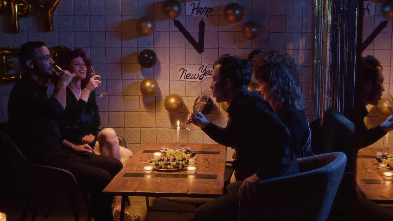 People celebrating New Year's Eve at a party