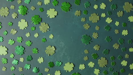 overhead studio shot of green shamrock shapes with copy space to celebrate st patricks day