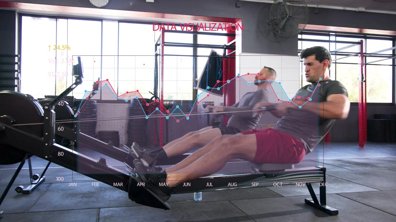 Lead man pulling handle, rowing on erg as partner joins, animated chart overlay tracking fitness