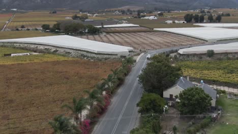 Car-Driving-In-The-Road-Along-Countryside-Farm-and-Fields-In-South-Africa