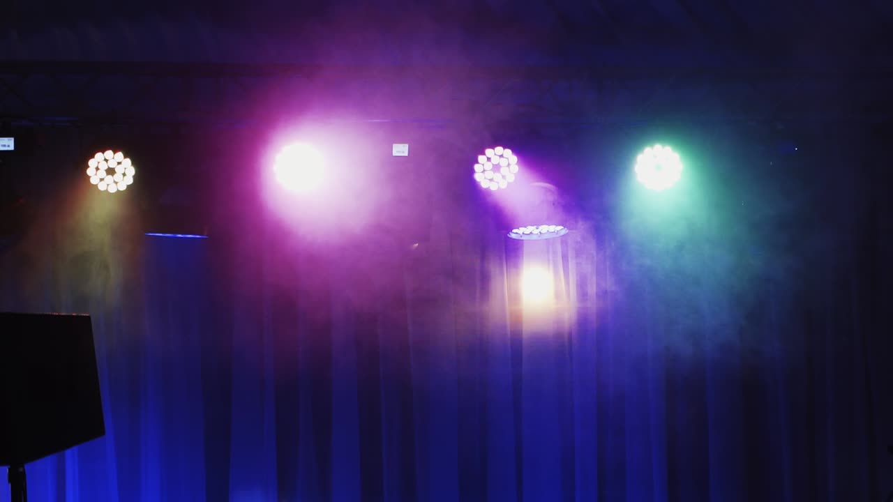 Stage lights with smoke on concert. Beautiful background with concert lighting on stage