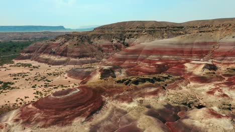 aerial of colorful bentonite hills near hanksville, utah, usa - drone shot