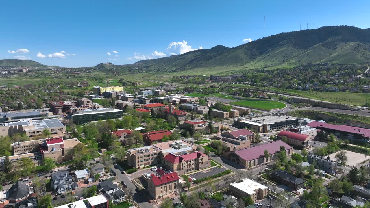 High aerial Drone view of Colorado Mountian town of Golden Colorado, Near Denver with Colorado school of mines in the background