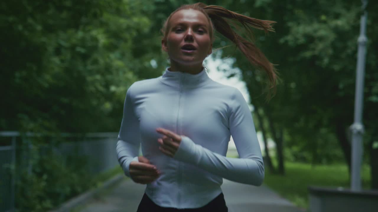 Woman running in a park