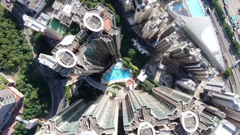 downtown hong kong city skyscrapers and urban traffic, aerial view