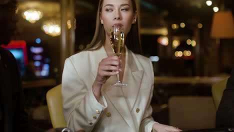 woman playing poker at the casino.