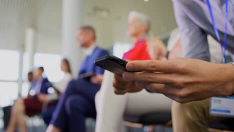 businessman using mobile phone in the business seminar 4k