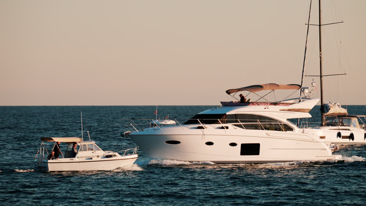 White boats moving on the sea in Golfe-Juan, France