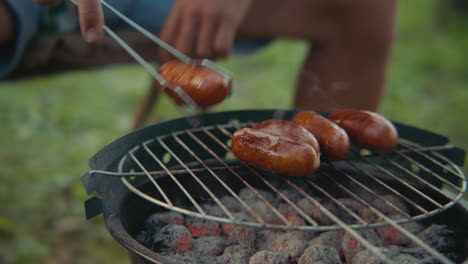 grilling sausages outdoors