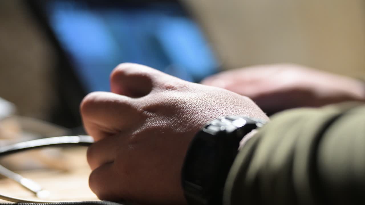 Inside a secret underground bunker, a Ukrainian soldier remotely controls a military drone, targeting Russian forces under the cover of night in Ukraine.