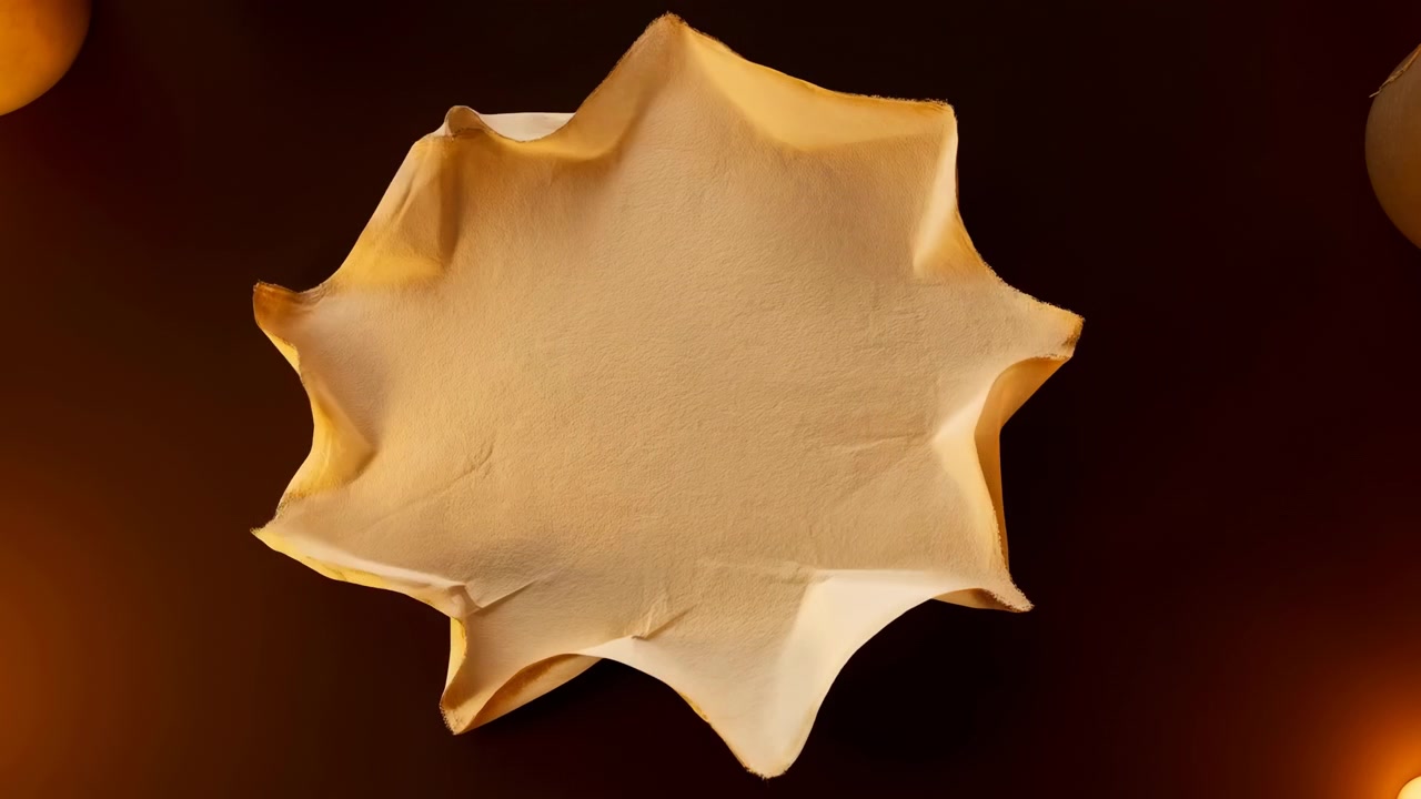 Yellow crumpled textile or paper form shifts from tight compressed ball into open hollow shape, then relaxes toward flat scalloped disk on dark brown background with warm directional light