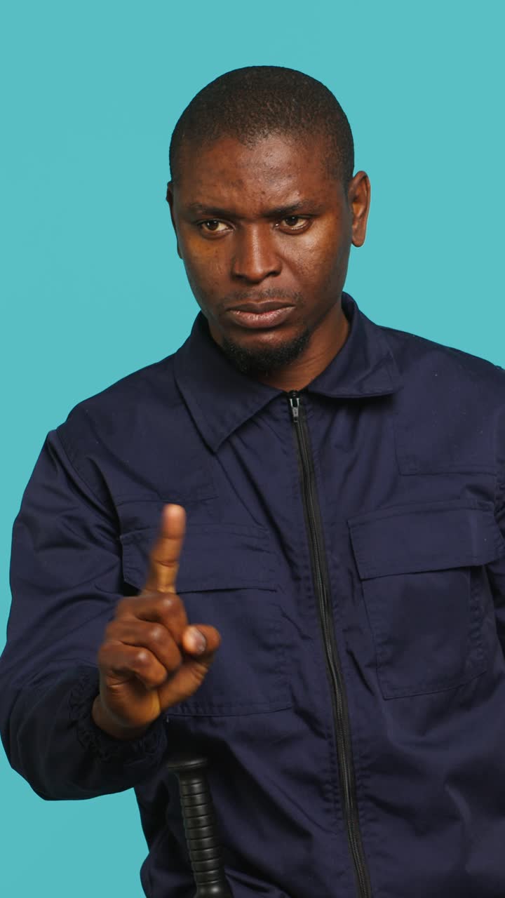 African American Man Shaking Finger in Disapproval