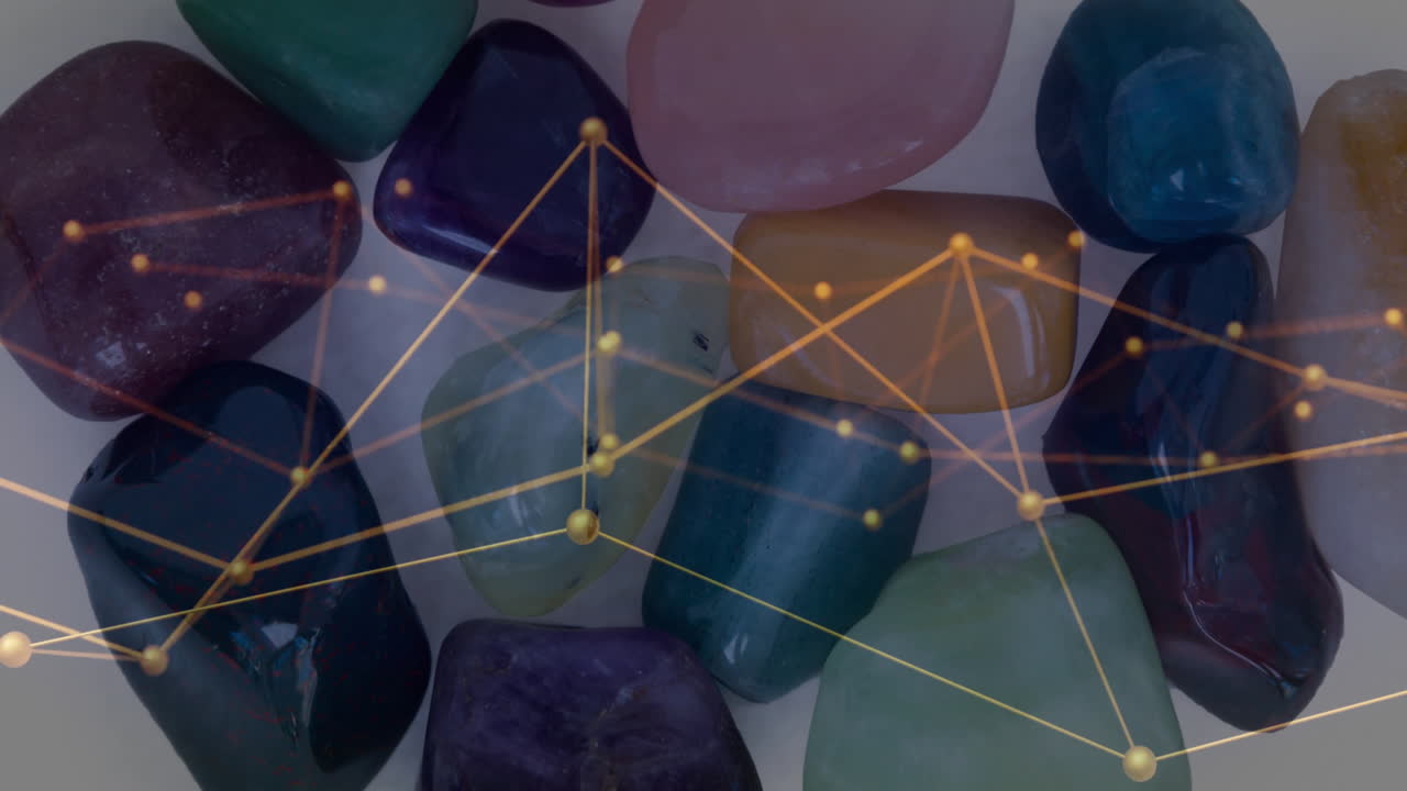 Polished stones being connected by glowing golden network nodes and mesh, in animated illustration