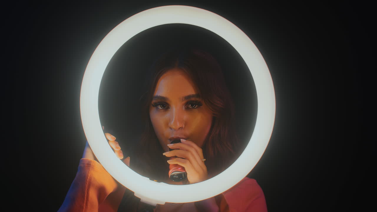 Gen Z Girl Smoking Vape behind Ring Light