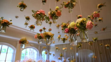 elegant hanging flower decorations in an event venue