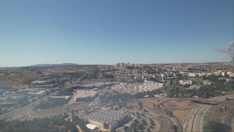 pan shot the lisbon city fire event from a distance, visible clouds of smoke