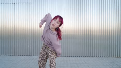 young urban dancer performing energetic street dance routine