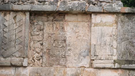 bas-relief from venus platform, depicting feathered serpents, chichen itza archaeological site.