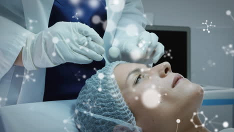 animación de moléculas sobre la cabeza de una mujer caucásica que tiene un botox