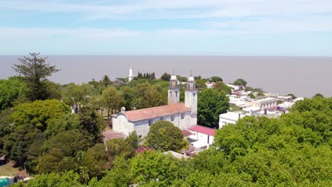 Aerial-View-Of-Basilica-Of-The-Holy-Sacrament-On-The-Coastal-City-Of-Colonia-del-Sacramento-In-Uruguay