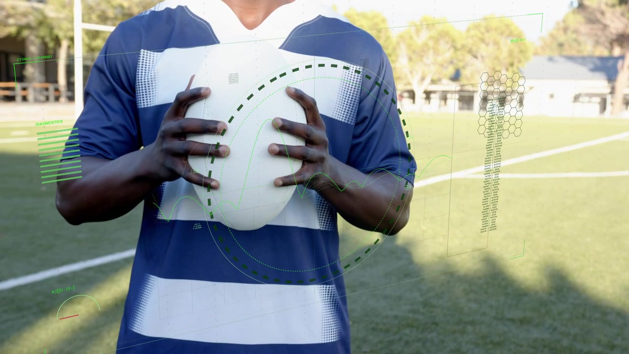 Giocatore che afferra e solleva la palla al petto su un campo sportivo, con anelli che si espandono intorno alla palla, mentre effettua un passaggio al centro.