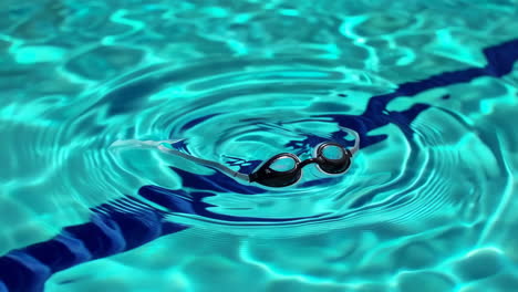 swimming goggles in a swimming pool