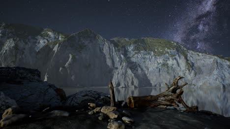 hyperlapse of night starry sky with mountain and ocean beach in lofoten norway