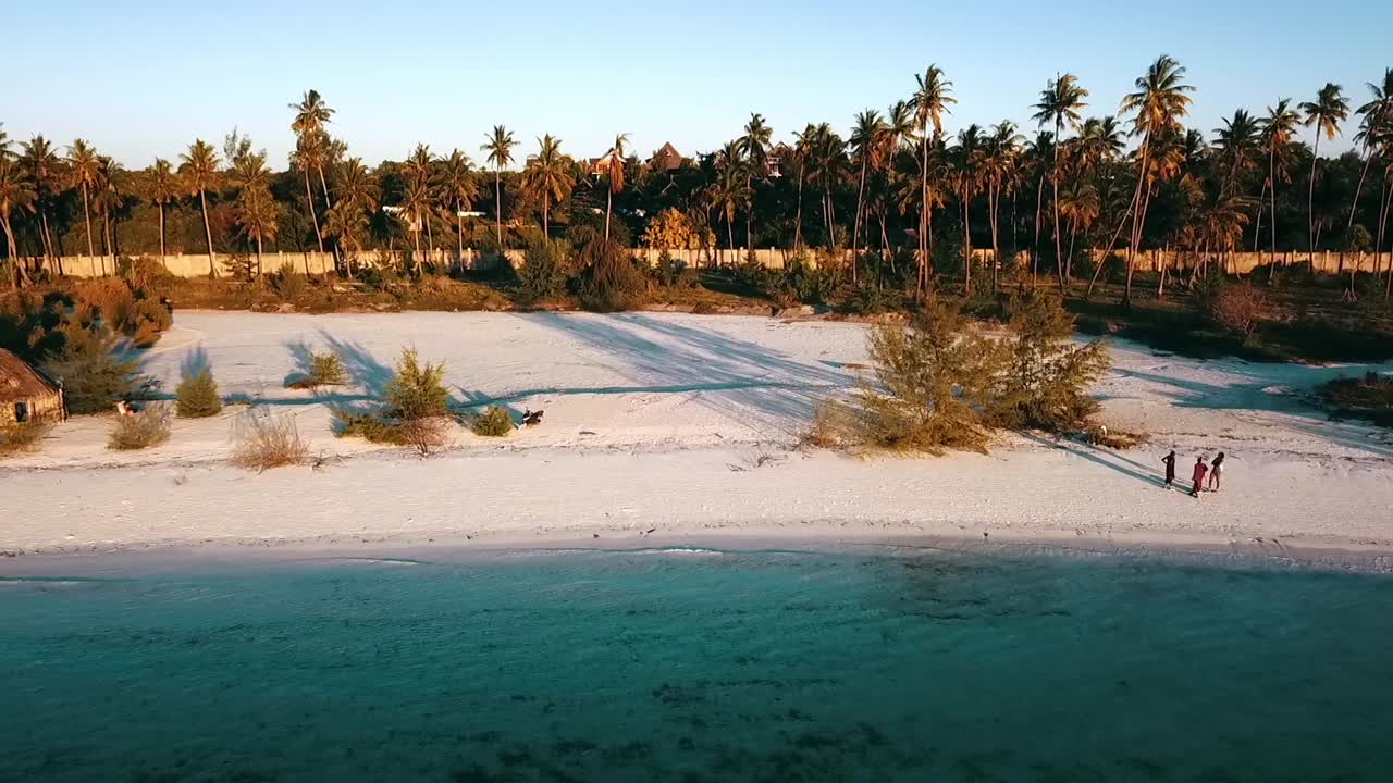 Smooth fly backwards slowly rise up drone shot
