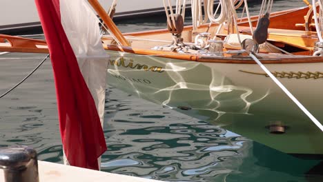 a boat reflecting on calm water